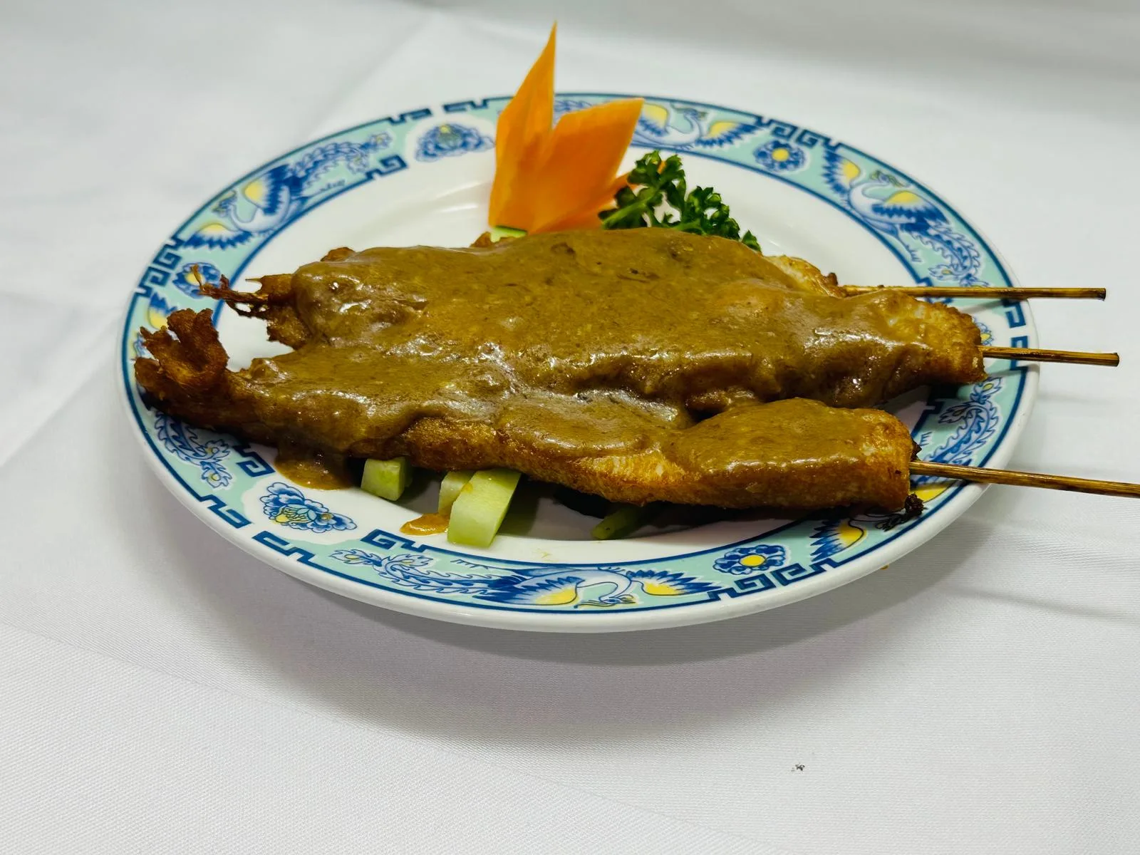 Chicken skewers with satay sauce